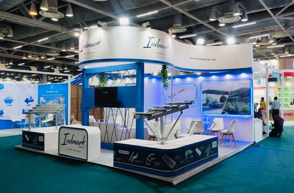 High-impact booth design with hanging banner and LED walls